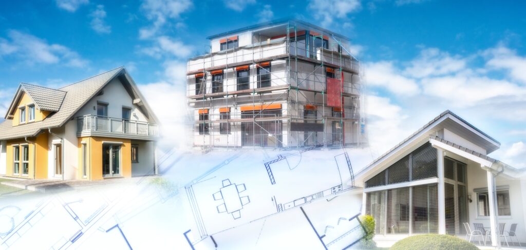 Häuser und Rohbau mit Bauplänen